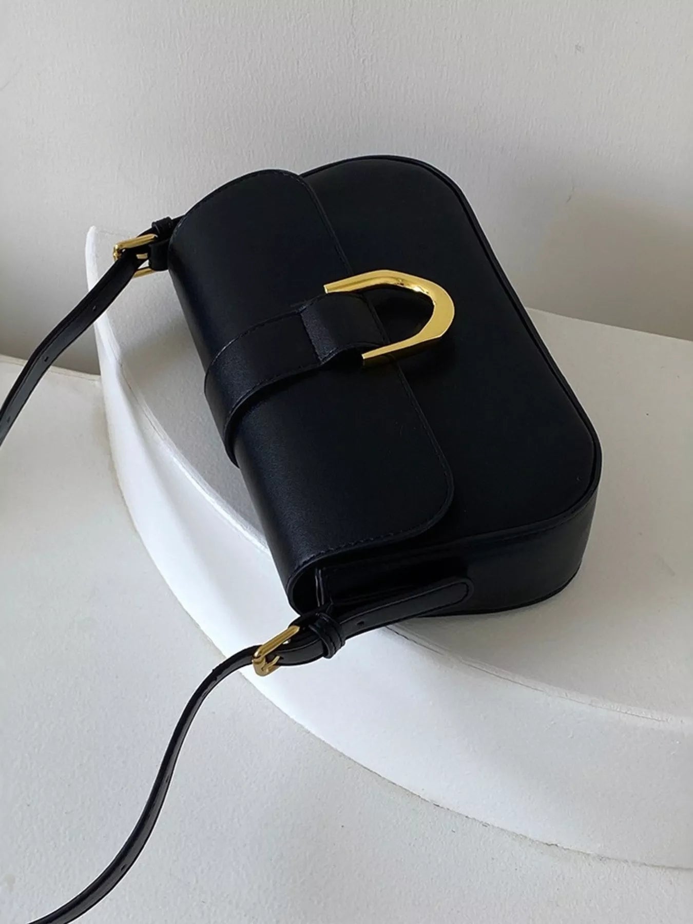 Durable crossbody bag with adjustable strap and spacious design