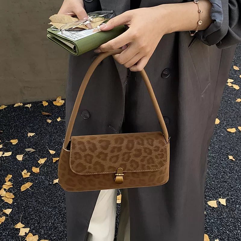 Close up of leopard print pattern on shoulder bag