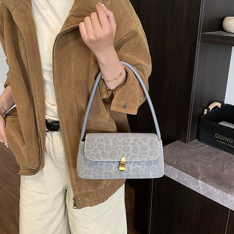 Leopard Print Chic Shoulder Bag styled with outfit on model