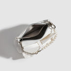 Close up of bow detail on Pearl Chain Underarm Bag