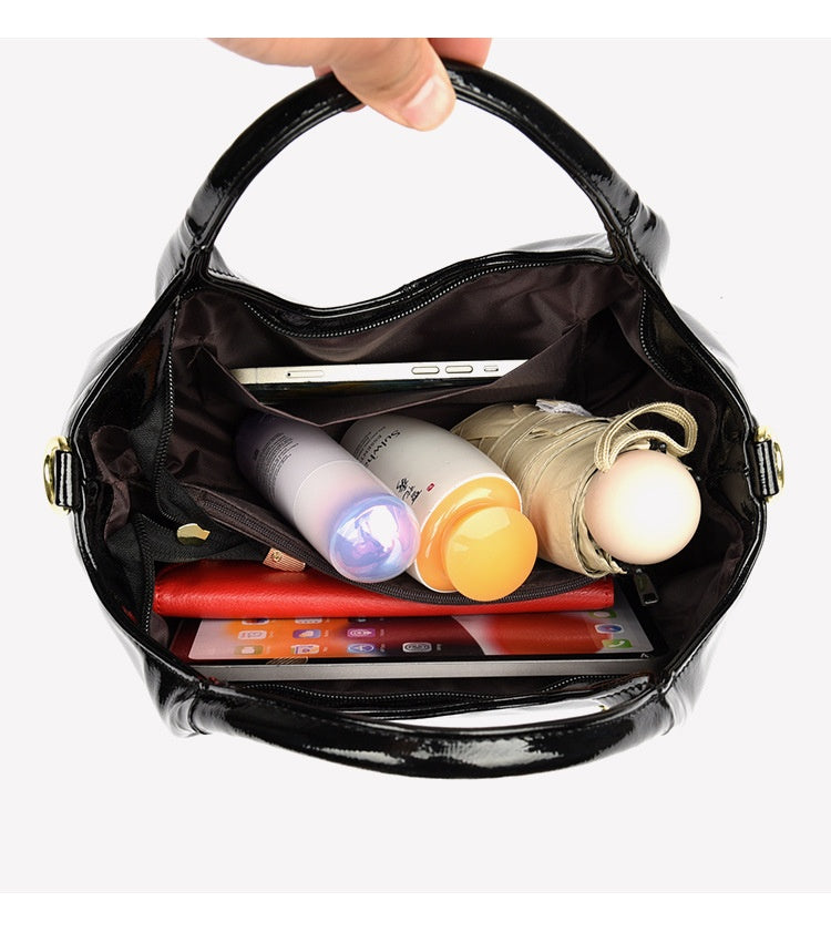 Packaging and accessory details of Premium Glossy Commuter Leather Bag