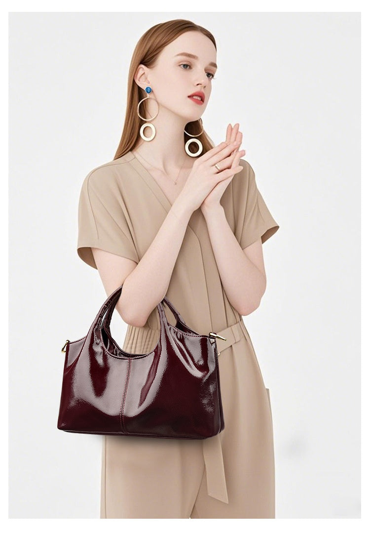 Premium Glossy Commuter Leather Bag styled with outfit on model