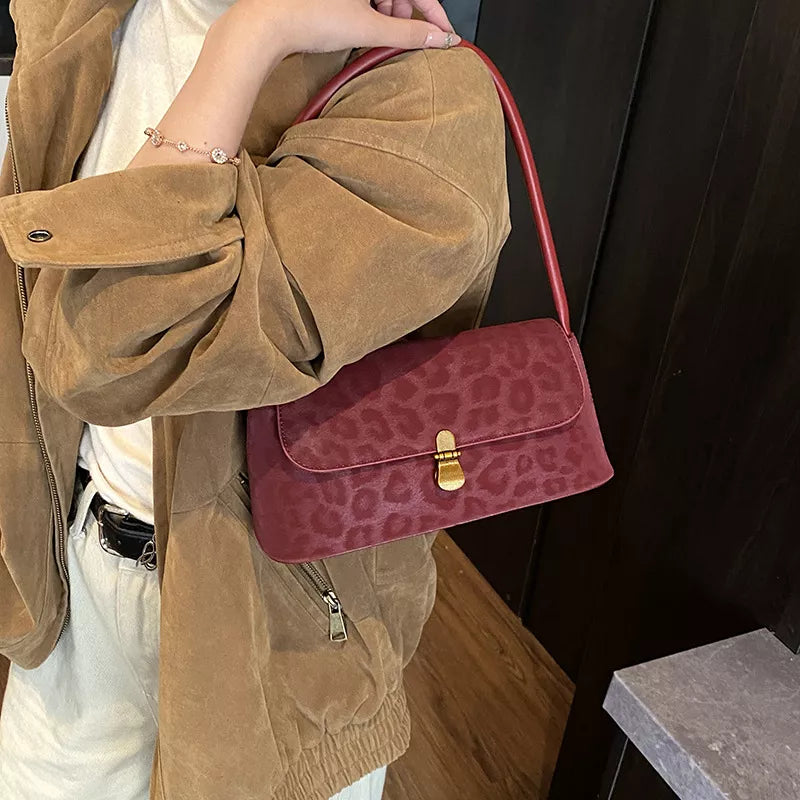 Interior of Leopard Print Chic Shoulder Bag showing compartments